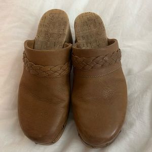 Brown clogs with braid across the top